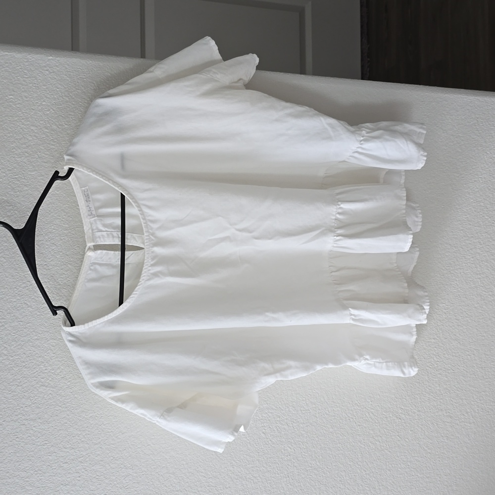 Free People peplum short sleeve blouse size medium